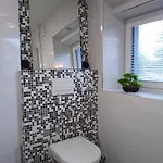 Rum i privatbostad Apartman Hevlin